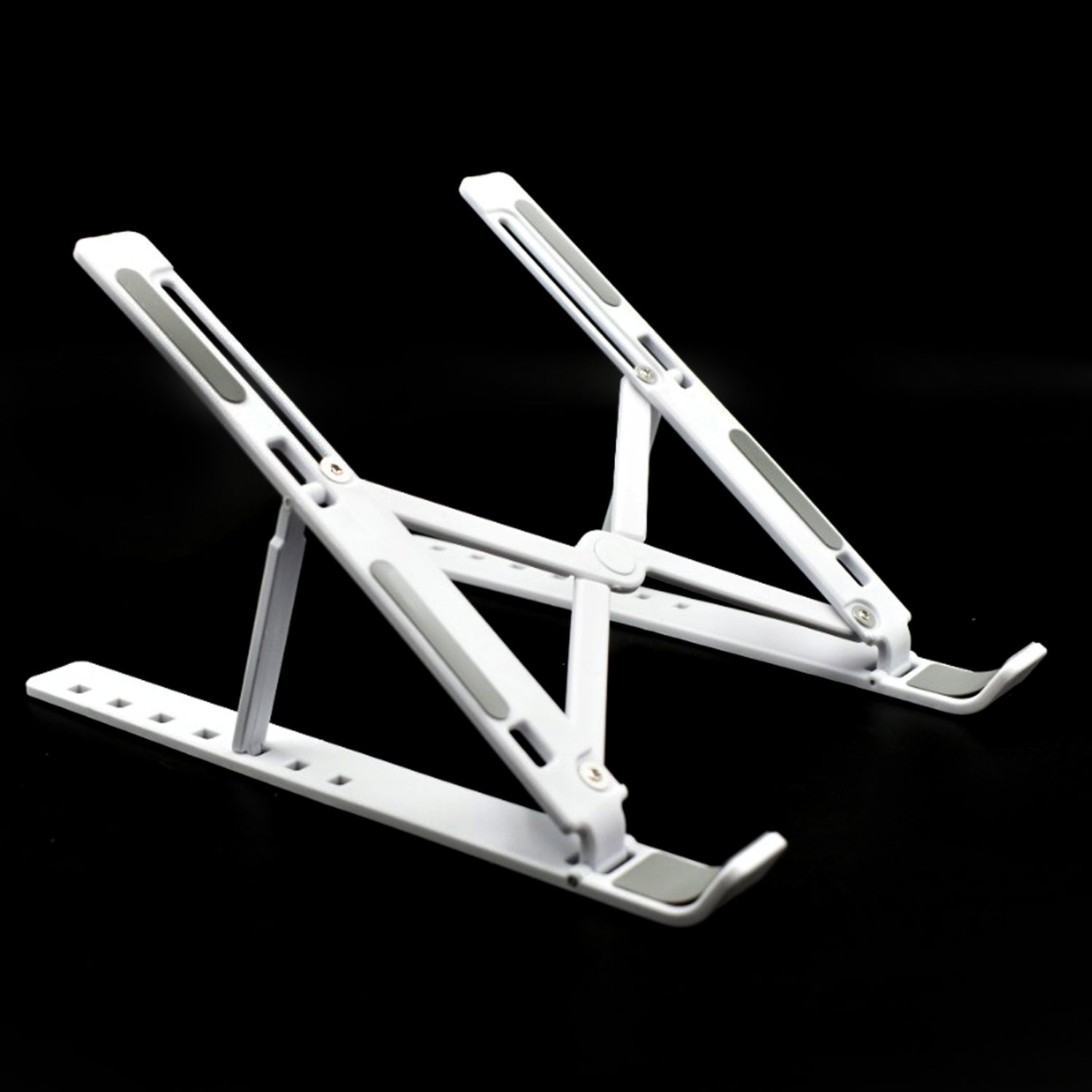 Foldable laptop stand in ergonomic design Foldable laptop stand in ergonomic design